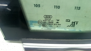 Деталь Audi с маркировкой, вид с близкого расстояния.