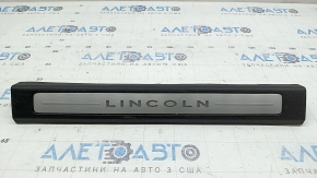 Накладка порога передня ліва Lincoln MKZ 17-20 хром з підсвічуванням, чорна, подряпини