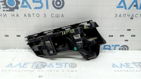 Кріплення заднього бампера ліве VW Jetta 22-26 під ліхтарем