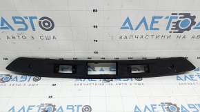 Планка підсвічування номера дверей багажника VW Tiguan 09-13 потерта