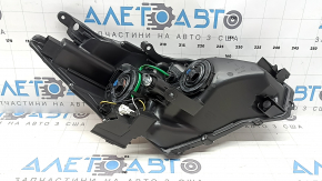 Фара передняя левая Toyota Prius V 12-14 дорест галоген
