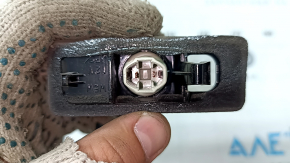 Подсветка номера двери багажника левая Toyota Prius V 12-17