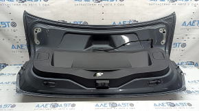 Крышка багажника в сборе VW Jetta 25-26 графит LD7X, с фонарем, обшивкой, отбойниками, замком, эмблемой, ручкой и камерой, царапины