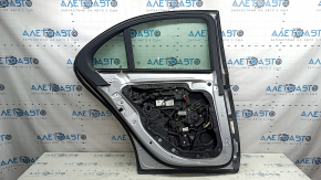 Дверь в сборе задняя левая Mercedes W213 E 17-23 keyless, серебро 775, царапина