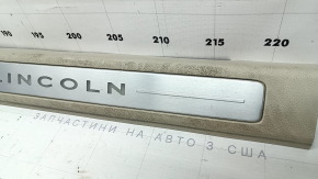 Накладка порога передняя левая Lincoln MKZ 17-20 хром с подсветкой, бежевая, царапины, под чистку
