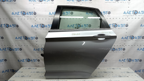 Дверь в сборе задняя левая VW Jetta 19-26 серебро LB7S, тычка