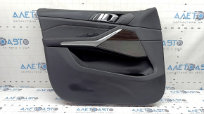 Обшивка дверей картка передня ліва BMW X5 G05 19-23 чорна шкіра, вставка під дерево Fineline Stripe, підлокітник шкіра чорна, з ручкою, накладками і кнопками, подряпини