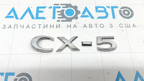 Емблема напис СХ5 двері багажника Mazda CX-5 20-24 зламана спрямовуюча