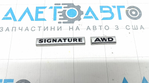 Емблема напис SIGNATURE AWD дверцята багажника Mazda CX-5 22-25 полізла фарба