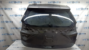 Дверь багажника голая со стеклом Ford Edge 19-24 графит M7, с спойлером, с трапецией, левым молдингом стекла, царапины на стекле