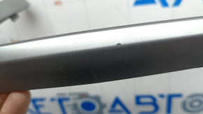 Накладка передней панели левая Audi A3 22-26 нижняя, серая, тычка, скол, царапины