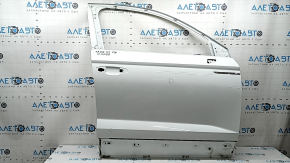Дверь голая передняя правая VW Taos 22-25 белый PC9A, тычки