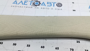 Накладка передньої стійки ліва верхня Mercedes C-class W205 16-21 бежева, надірвана тканина, під чищення