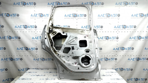 Двері голі задні ліві Ford Escape MK3 13-19 срібло UX, в кіптяви, корозія по кромці