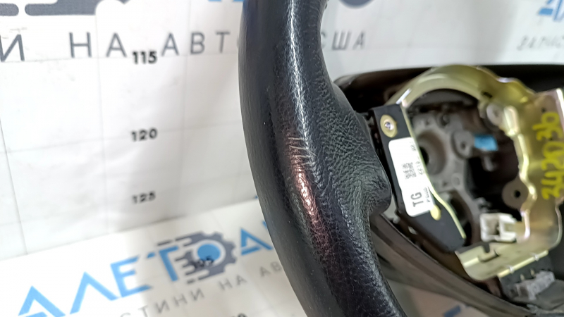 Руль голый Nissan Leaf 13-17 кожа черный с подогревом, трещины, царапины, затерт, вмятины