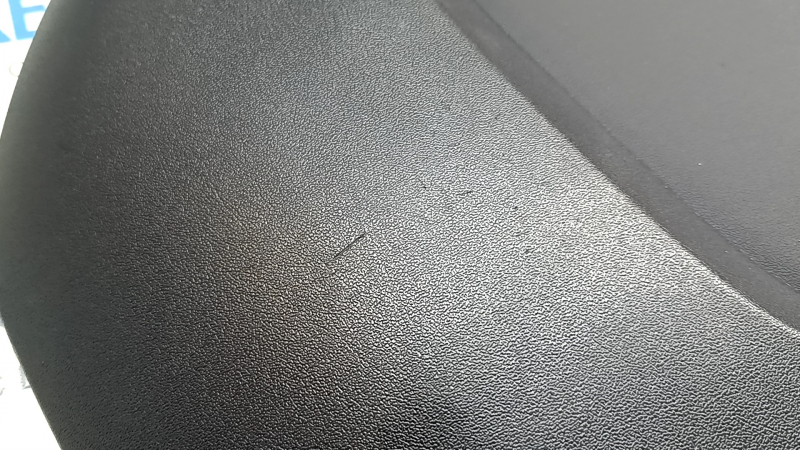 Накладка водительского сидения задняя Tesla Model 3 18-23 черная, царапины, сломано крепление