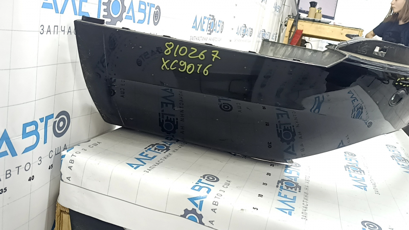 Бампер задний голый нижняя часть Volvo XC90 16-26 под парктроники, черный, царапины, примят