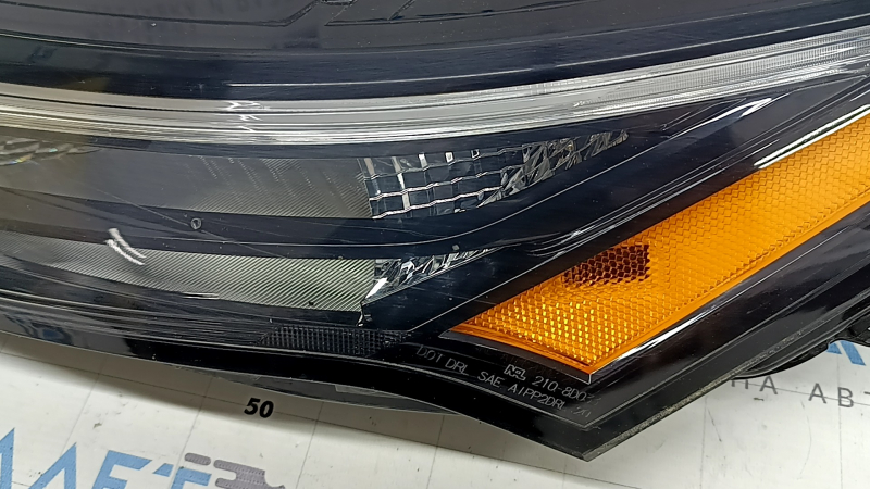 Поворотник ДХО левый Nissan Rogue 21-26 галоген + LED us built, царапины