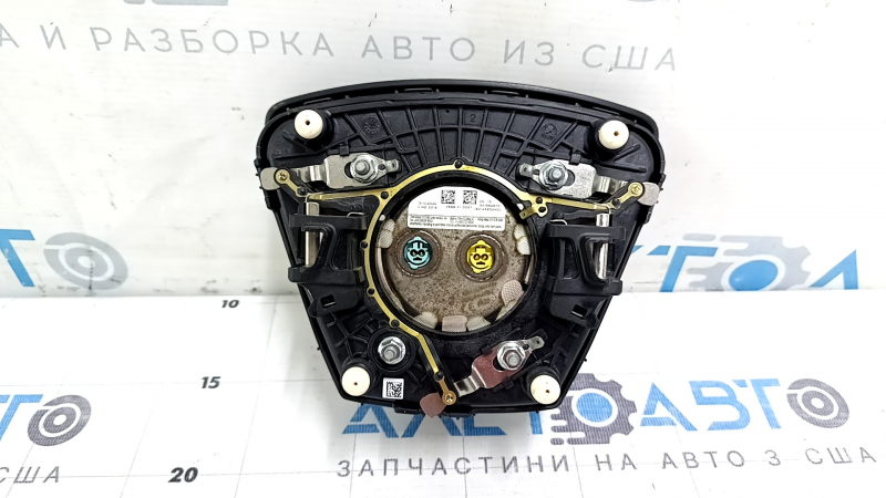 Обратная сторона подушки безопасности руля Ford Escape 2013-2019, вид с крепежом.