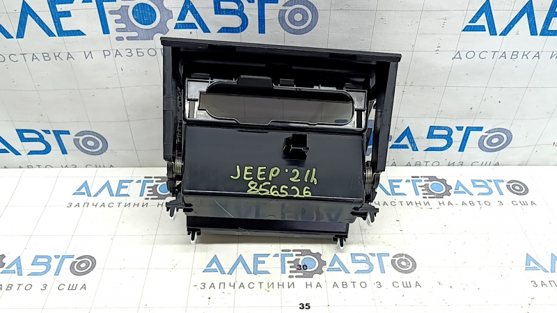 Вид кармана центральной консоли Jeep Grand Cherokee WL 21-26 с оригинальным номером 856526.