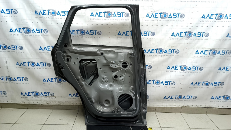 Дверь голая задняя левая Audi Q3 83A 19-25 графит LX7G, вмятина