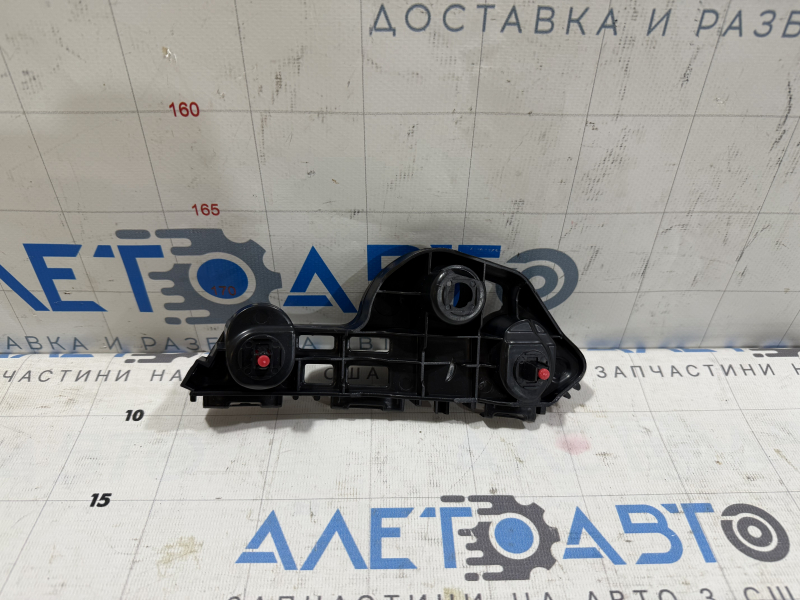 Крепление переднего бампера правое Toyota Camry v70 18-24