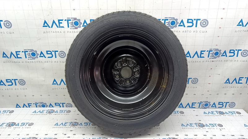 Запасное колесо докатка Toyota Camry V50 12-14, представлено в ракурсе спереди.