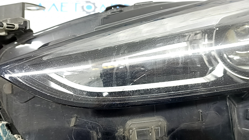 Фара передняя левая в сборе Mazda 6 18-21 usa LED без AFS, полез лак, под полировку, царапина