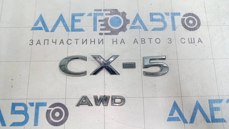Эмблема надпись СХ5 AWD двери багажника Mazda CX-5 22-25 сломано крепление