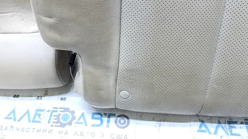 Спинка заднего ряда сидений 2 ряд левая Nissan Rogue 14-15 кожа бежевая, перфорация, замята, под химчистку