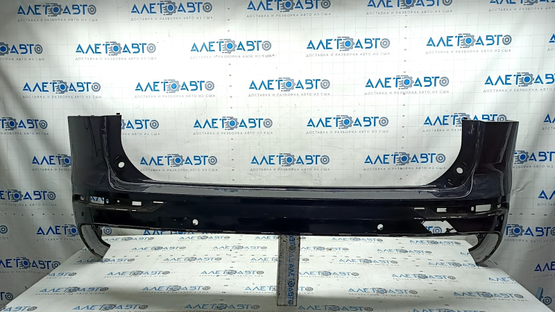 Задний бампер от Volvo XC60, с видимыми царапинами и потёртостями, состояние Б/У.