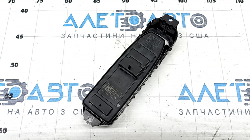 Обратная сторона управления стеклоподъемником переднего левого двери Mitsubishi Outlander, чистая без повреждений