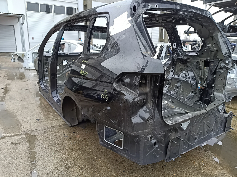 Фото задней левой части кузова BMW X7 G07, оригинальная деталь без видимых дефектов, состояние хорошее.