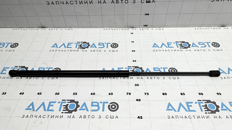 Амортизатор двери багажника правый Nissan Versa Note 13-19