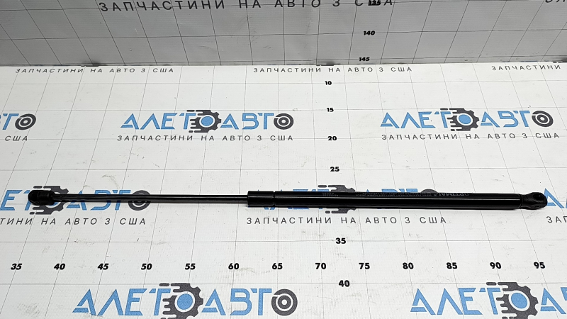 Амортизатор двери багажника правый Nissan Versa Note 13-19