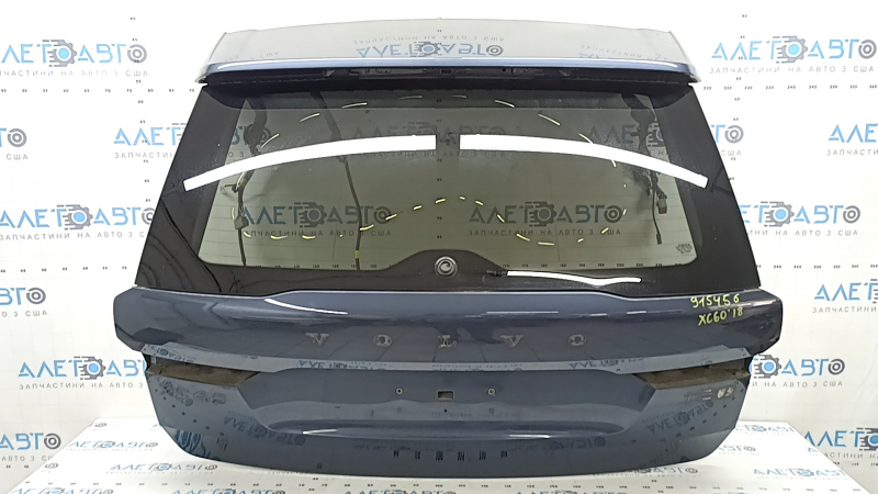 Дверь багажника Volvo XC60 2018-2026 с незначительными потертостями на поверхности.