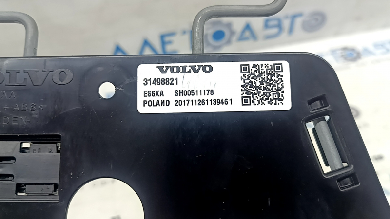 Маркировка оригинала на подпоре водительского сиденья Volvo XC60 2018-2026.