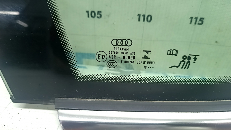 Деталь Audi с маркировкой, вид с близкого расстояния.