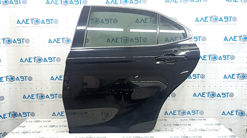 Дверь в сборе задняя левая Toyota Camry v70 18-24 черный 218, вмятина