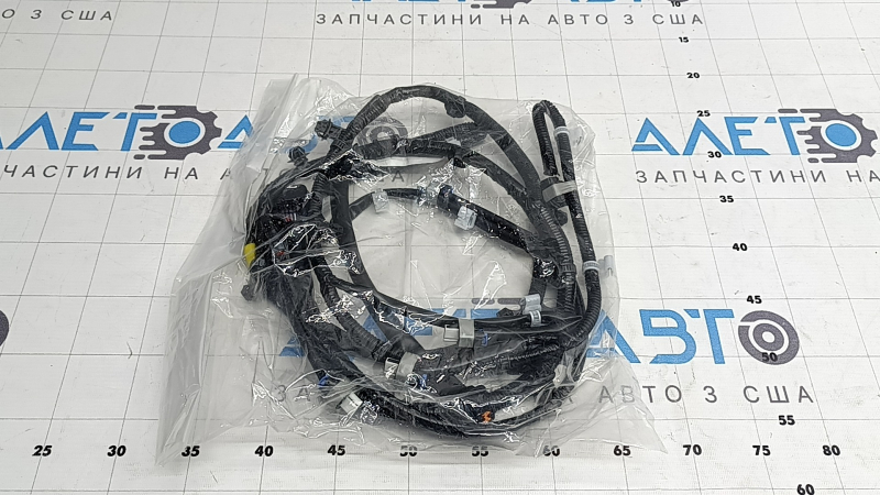 Проводка переднего бампера Mitsubishi Outlander 22-26 под парктроники, ПТФ и камеру