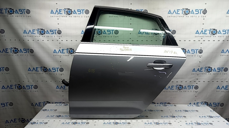 Дверь в сборе задняя левая Audi A4 B9 17-19 серебро LZ7G, keyless, крашена 0,15, тычки, вмятина