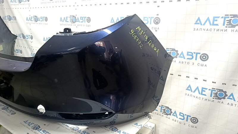 Бампер задний голый Mazda 3 19-26 4d, синий, незаводские отверстия, отсутствует фрагмент, трещина