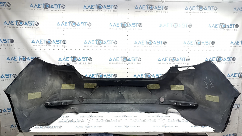 Бампер задний голый Mazda 3 19-26 4d, синий, незаводские отверстия, отсутствует фрагмент, трещина