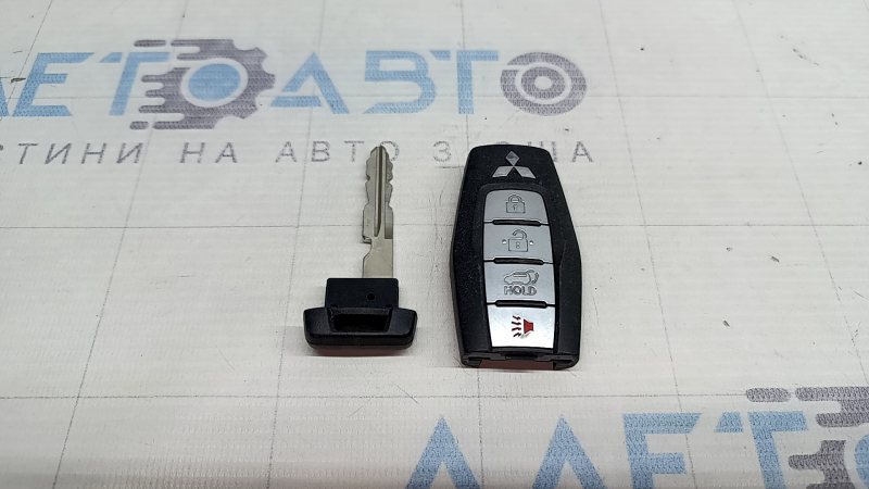 Ключ smart key Mitsubishi Outlander 22-26 4 кнопки, тички, подряпини