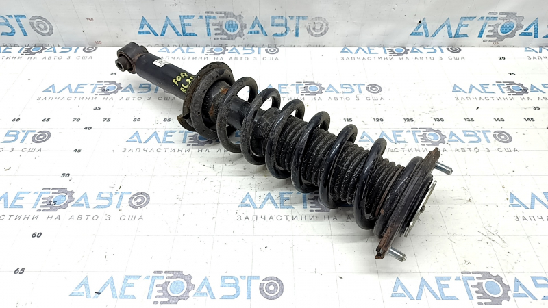 Стойка амортизатора в сборе задняя левая Subaru Forester 25-26