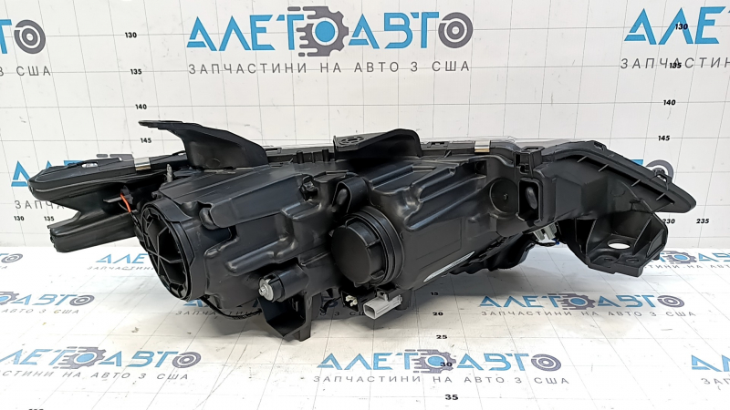 Фара передняя левая Mitsubishi Outlander 16-22 галоген, рест, оранжевый отражатель