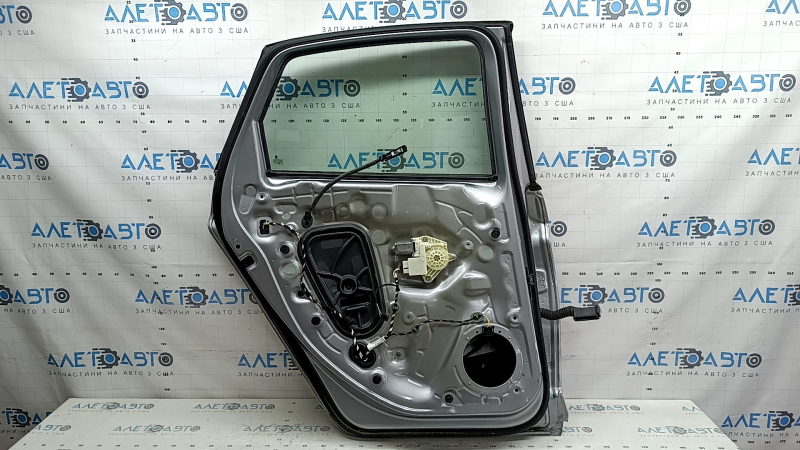 Дверь в сборе задняя левая VW Jetta 19-26 серебро LB7S, тычка