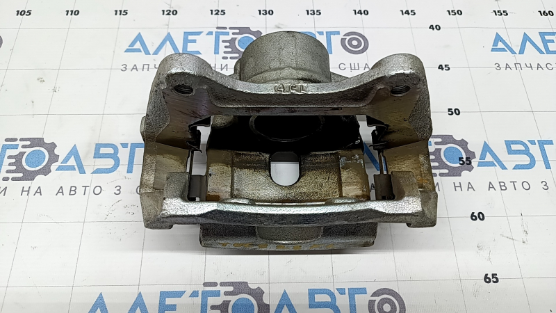 Супорт у зборі передній лівий Hyundai Tucson 22-26 1.6T HEV
