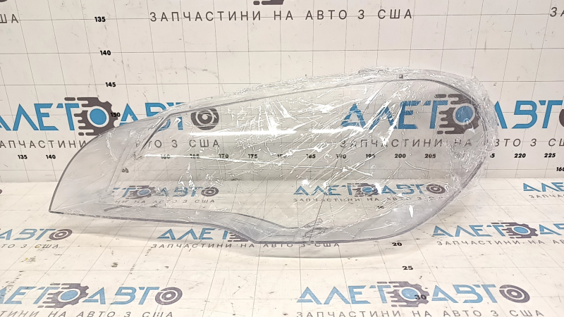 Скло фари передньої лівої BMW X5 E70 11-13 рест, оптичний полікорбонат