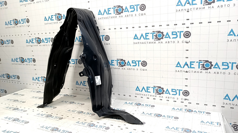 Підкрилок передній лівий Mazda CX-7 06-09